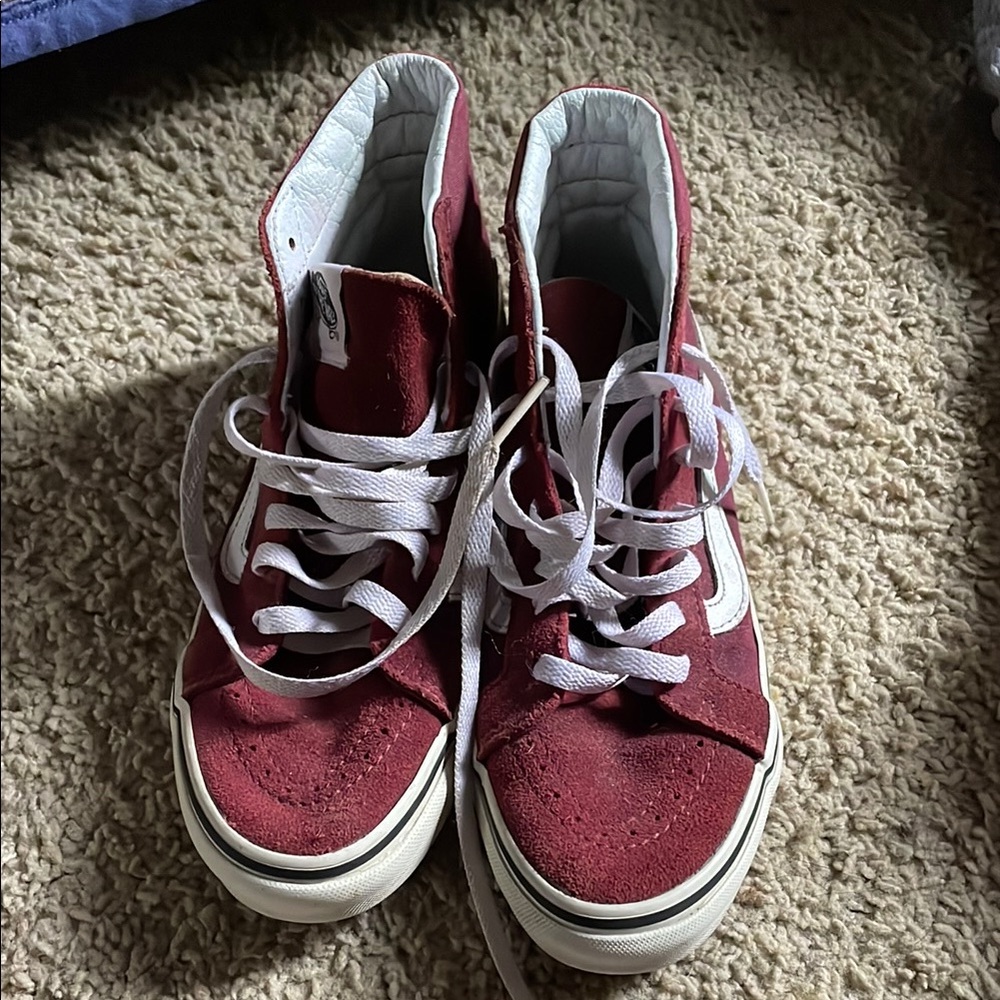 Red sneakers high top Vans